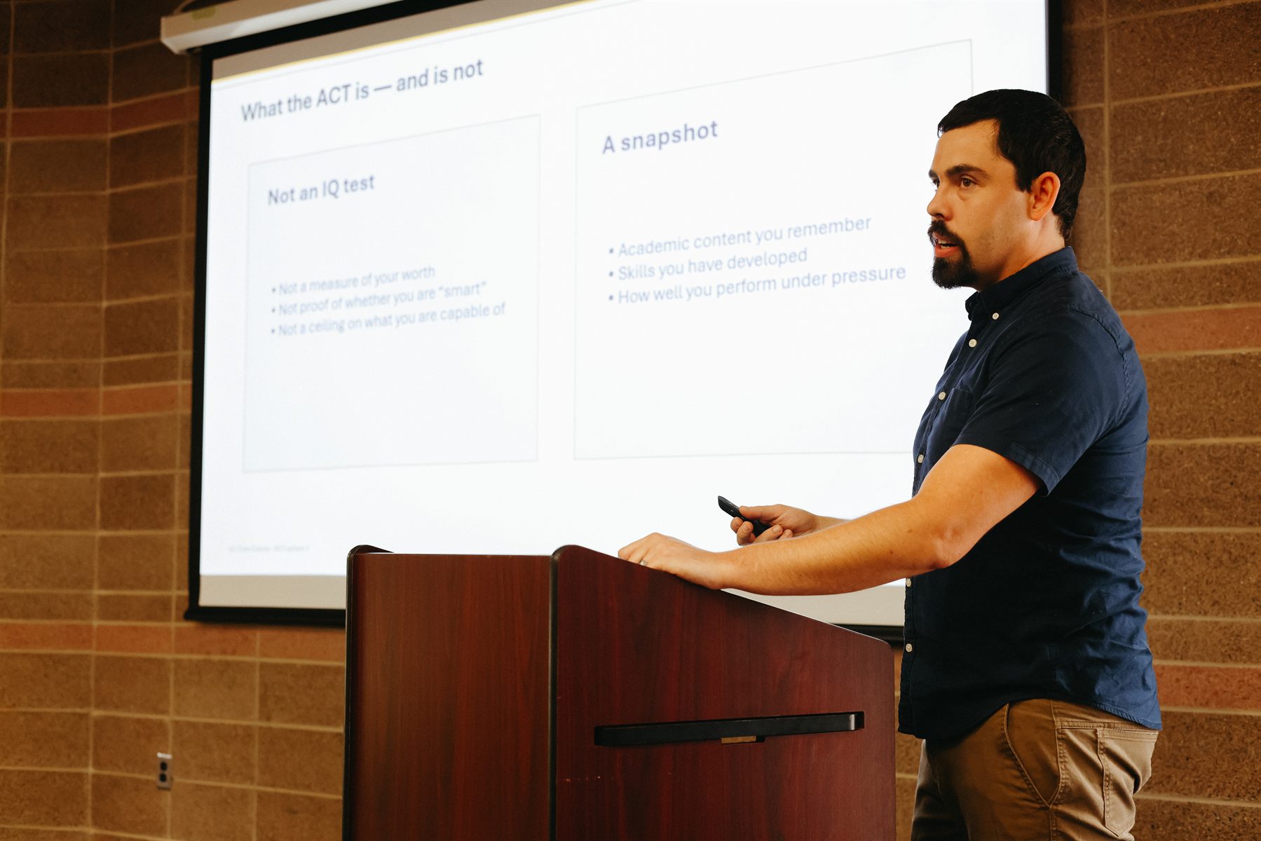 Adam Lang teaching ACT strategy at the front of a Kansas City classroom